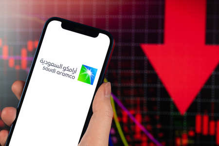 Kharkov, Ukraine - February 11, 2022: Saudi Aramco stock trade on red chart. Arabian oil company, gas industry. finance market backgroundのeditorial素材