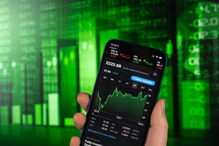 Kharkov, Ukraine - February 11, 2022: Saudi Aramco stock trade on green chart. Arabian oil company, gas industry. finance market backgroundのeditorial素材