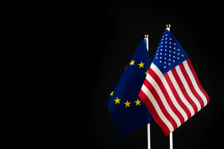 USA and Europe EU flag. Conflict, world crisis and war concept. Sanctions pressure in politics. black backgroundの写真素材