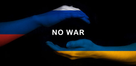 Russia vs Ukraine flag NO WAR concept. Crisis, military conflict background. Hands with flags on...