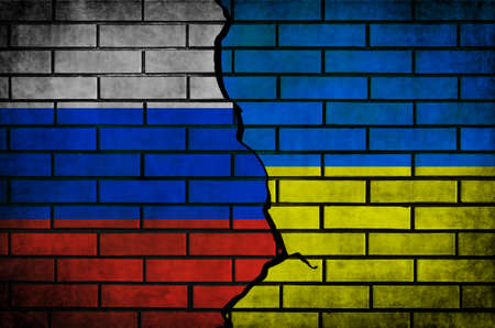 Russia vs Ukraine conflict and war flags background photoの写真素材