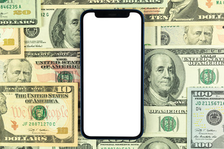 Flat lay Apple iPhone mockup, business office desktop with money and dollar bills background. Top view, copy space photoのeditorial素材