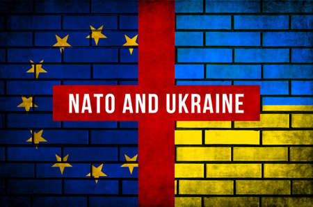 NATO and Ukraine flags background. Conflict, protest and russian invasion, war concept photoの写真素材