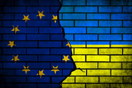 Europe and Ukraine flags background. European union and Ukraine, NATO. Conflict, protest and russian invasion, war conceptの写真素材