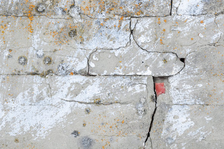 Old ruined brick wall with cracks. high detailed texture background photo