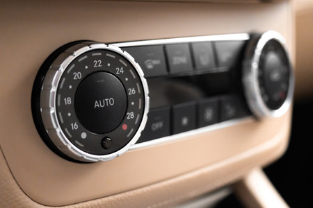 Climate control unit in the new luxury sport car close-up view photoの写真素材