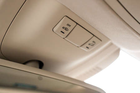 Closeup of cabin lights switch in car, light control panel inside a car interior. For reading etc.の写真素材