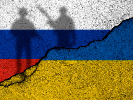 Russia and Ukraine flags. Military soldiers, armed men silhouette. War crisis, political conflict. Cracked concrete wall background photoの写真素材