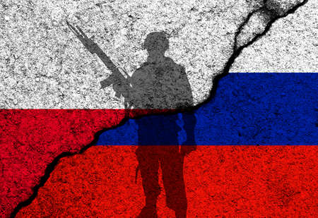 Poland and Russia conflict. Concept of war and invasion on Europe. Flags painted on concrete wall backgroundの写真素材