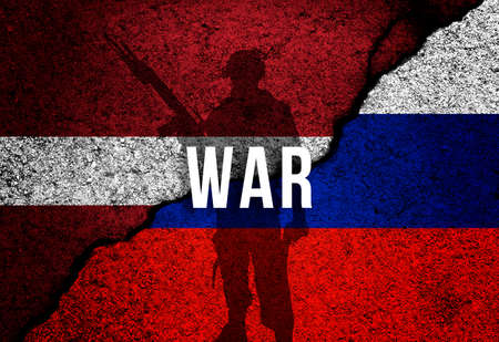 Latvia and Russia conflict, war and invade concept. Armed men silhouette. Flags painted on concrete wall backgroundの写真素材