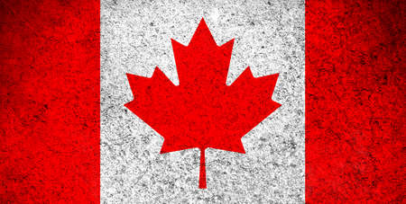Canada flag, grunge texture background photo. National country flag painted on concrete wallの写真素材