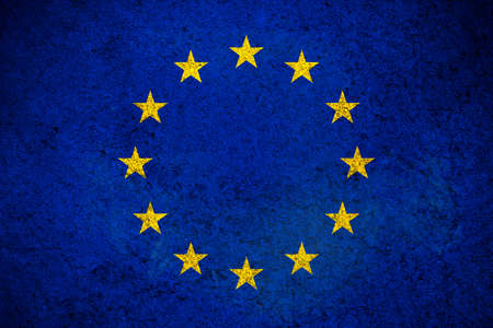 Europe Union flag, grunge texture background photo. flag painted on concrete wallの写真素材