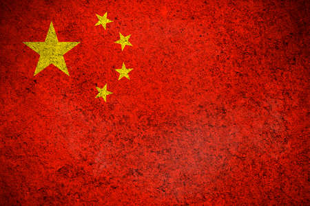 Chinese flag, grunge texture background photo. National country flag painted on concrete wallの写真素材