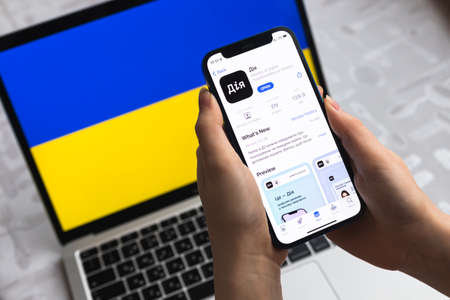 Poltava, Ukraine - April 8, 2022: DIIA app. Ministry of Digital Transformation of Ukraine application. digital passport in mobile phone photoのeditorial素材
