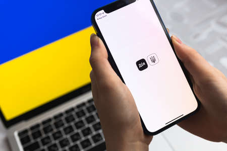 Poltava, Ukraine - April 8, 2022: DIIA app. Ministry of Digital Transformation of Ukraine application. digital passport in mobile phone photoのeditorial素材
