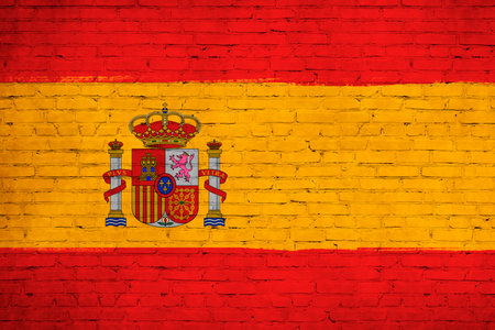 Spain flag painted on brick wall. national country flag backgroundの写真素材