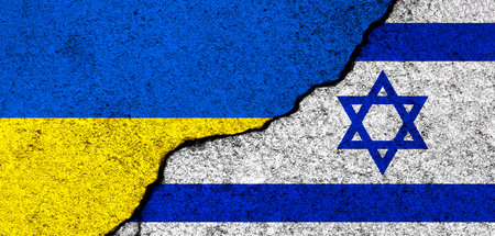 Ukraine and Israel flags. Support and help, weapons and military equipment, partnership and diplomacy, humanitarian aid and donations for Ukrainian refugees photoの写真素材