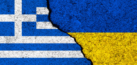 Ukraine and Greece flags. Support and help, weapons and military equipment, partnership and diplomacy, humanitarian aid and donations for Ukrainian refugees photoの写真素材