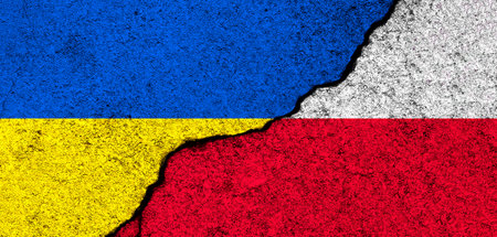 Ukraine and Poland flags. Support and help, weapons and military equipment, partnership and diplomacy, humanitarian aid and donations for Ukrainian refugees imageの写真素材