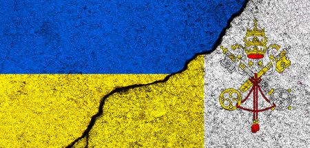 Ukraine and Vatican city flags. Support and help, weapons and military equipment, partnership and diplomacy, humanitarian aid and donations for Ukrainian refugees photoの写真素材