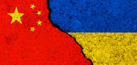 Ukraine and China flags. Support and help, weapons and military equipment, partnership and diplomacy, humanitarian aid and donations for Ukrainian refugees photoの写真素材