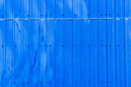 Blue metal steel sheet with rivets texture, high detailed backgroundの写真素材