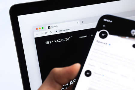 SpaceX company close-up view. Business and exploration concept background photoのeditorial素材