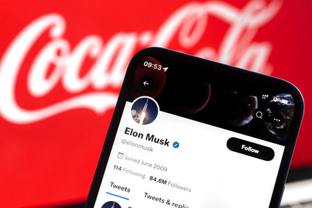 Elon Musk and Coca-Cola on background. Business and financial concept photoのeditorial素材