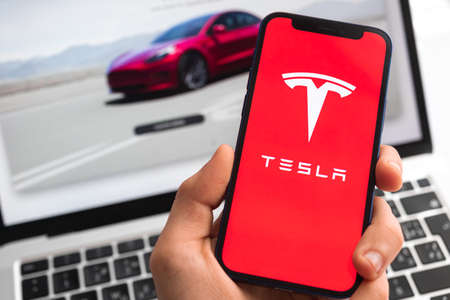 Tesla electric background. Elon Musk, Business and transportation of future concept photoのeditorial素材