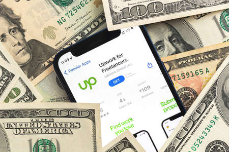 Poltava, Ukraine - April 28, 2022: Upwork for Freelancers app on smartphone, Upwork is a platform for freelancing jobs business concept photoのeditorial素材