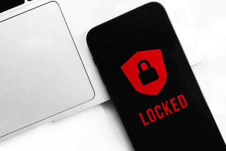 Privacy and security mobile data concept. Smartphone with padlock icon and locked text. Modern technology, protectionの写真素材