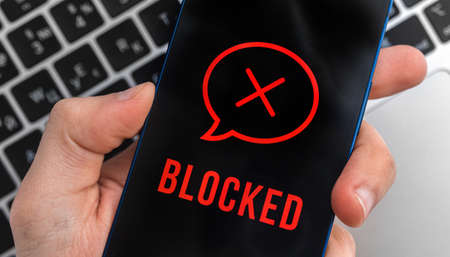 Blocked messages concept, mobile phone privacy background. Black screen with icon and text. modern technologies photoの写真素材