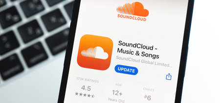 Poltava, Ukraine - May 2, 2022: Soundcloud app closeup, banner photo. Music streaming application for mobile phoneのeditorial素材