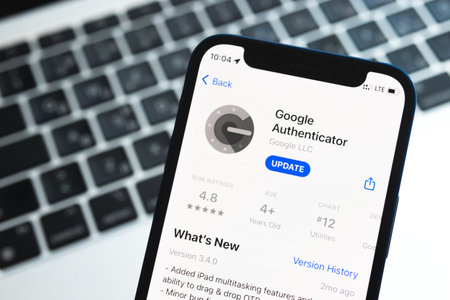 Poltava, Ukraine - May 2, 2022: Google Authenticator application, icon closeup. Mobile phone with security applicationのeditorial素材