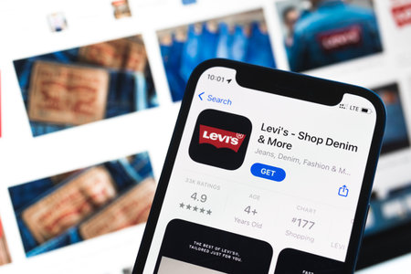 Poltava, Ukraine - May 2, 2022: Levi Strauss, an American clothing company, Levi's app icon on mobile phone close-up viewのeditorial素材