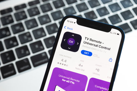 Poltava, Ukraine - May 2, 2022: TV Remote Universal Control app for mobile phone. Smart home concept photo with applicationのeditorial素材