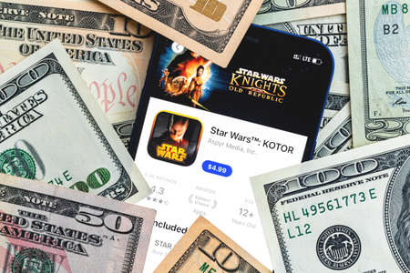 Star Wars Kotor mobile game app. Money background. Concept, company making money with popular mobile phone gamesのeditorial素材