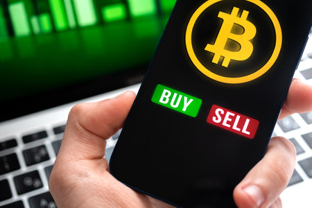 Modern way of exchange, bitcoin convenient payment method in global economy market background. smartphone in hand. Financial investment with virtual digital currency photoの写真素材
