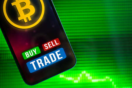 Bitcoin new virtual money concept and financial growth concept on green chart background, businessの写真素材