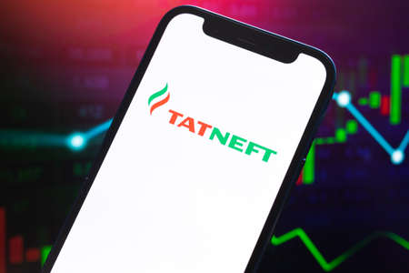 TATNEFT logo company, gas and oil prices, energy industry. Petroleum stock market graphs, global financial background. Gasoline and diesel conceptのeditorial素材
