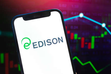 EDISON logo company, gas and oil prices, energy industry. Petroleum stock market graphs, global financial background. Gasoline and diesel conceptのeditorial素材