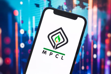 MPCL logo company, gas and oil prices, energy industry. Petroleum stock market graphs, global financial background. Gasoline and diesel conceptのeditorial素材