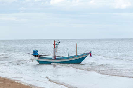Small fishing boats in the sea Hua Hin , Thailandの写真素材