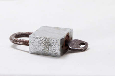 Close up lock and keys on white backgroundの写真素材