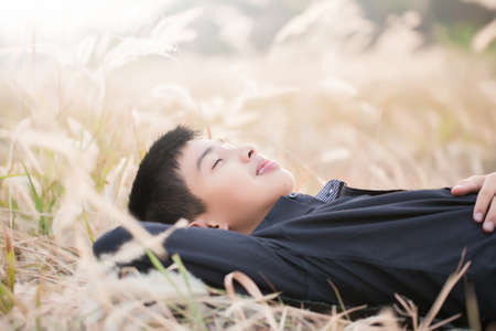 Portrait of Handsome teen boy outdoorsの写真素材