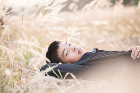 Portrait of Handsome teen boy outdoorsの写真素材