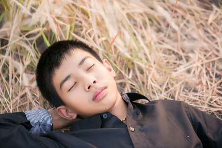 Portrait of Handsome teen boy outdoorsの写真素材