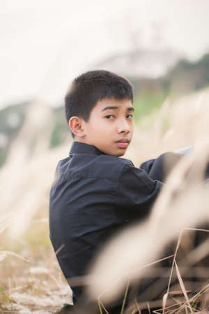 Portrait of Handsome teen boy outdoorsの写真素材