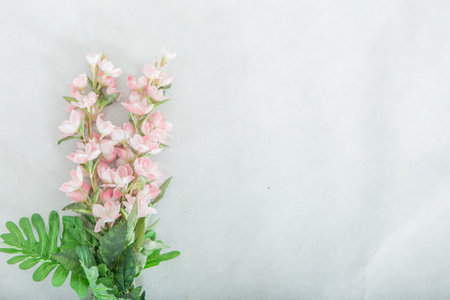 Pink flower bouquet In the corner of the white scene