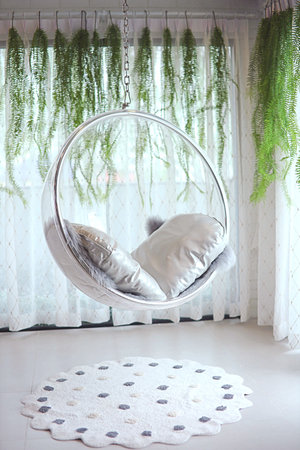 hanging chair Made of lightweight material.fastened with steel chain in a room with a design